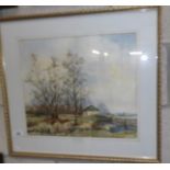 A John D Brownlow 20th century framed and glazed watercolour rural scene featuring church spire in