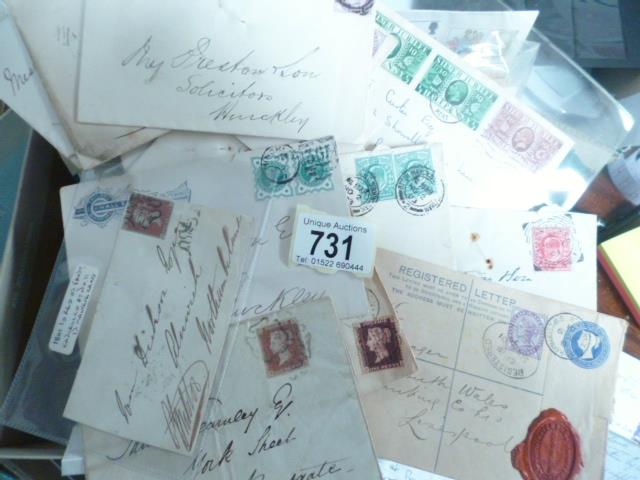 A box of stamped and postmarked envelopes - Victorian onwards plus 19th Century letters, bills etc.