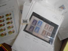 A box of World commonwealth sheets - mint and used