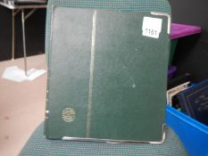 A stock album containing stamps from Cyprus, Gibraltar and Malta.