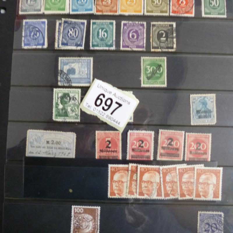 An album of German stamps including some Hitler,