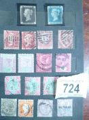 A small album of Victorian stamps including 1d black, 3 one penny reds etc.