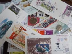 73 GB covers in album and envelope - 4 coin FDC's Wembley soccer covers etc.