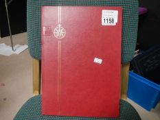 A stock book containing Canadian commems.