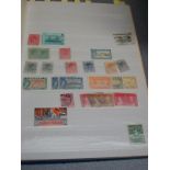 An album of commonwealth definitives and commemoratives