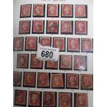 An album of GB stamps including approximately 148 'one penny reds' cat £2132
