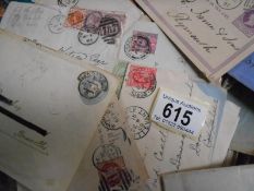 A box of stamped and postmarked stamps.