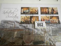 An album of British Isles coin cover collection FDC stamps