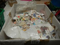 A large box of kiloware and loose stamps (unsorted)