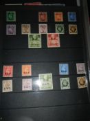 A large quantity of stamp pouch sheets with stamps - some mint,