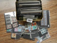 A box of stamp packs - GB,