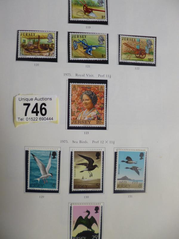 An album of Channel Island stamps - most mint U/M - singles, - Image 2 of 6