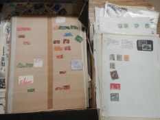 A large quantity of stamps on page sheets - UNSORTED - CLOSE INSPECTION RECOMMENDED