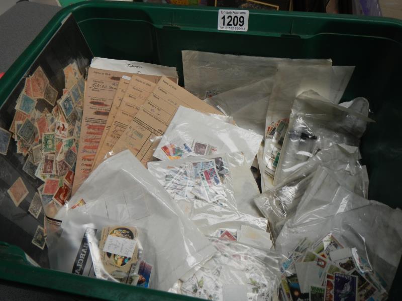 A large crate of packets of stamps