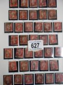 A GB album including approximately 136 one penny reds, 6 two penny blues,