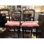 A pair of Mahogany bedroom chairs.