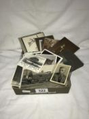 A tray of old postcards