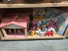 A collection of vintage 'my little pony' figures including rare examples and a show stable.