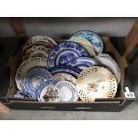 A box of collectors plates including blue & white & Lincoln Cathedral etc.