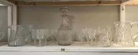 A collection of crystal glasses, brandy glasses, decanter etc.