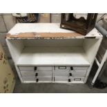 A painted/shabby chic workshop storage cabinet