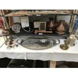 Two shelves of mixed silver plate and copper ware.