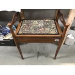 An Edwardian inlaid mahogany piano stool with tapestry top