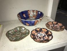 A quantity of oriental plates and dishes - some A/F