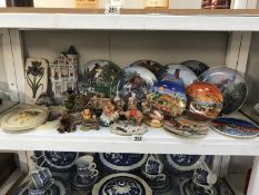 A collection of Lilliput Lane plates, Poole pottery seasons plates, plaques and figurines etc.