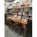 A pine kitchen table & 6 chairs