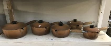 A set of Le Creuset cast iron saucepans