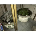 2 garden planters with plants