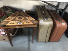 2 vintage suitcases & a musical side table