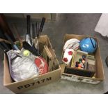 A quantity of sports games including tennis rackets, footballs, pool balls etc.