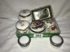 A tray of old pill boxes and a hand painted pin tray