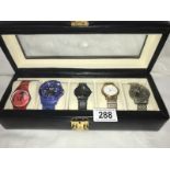 A box containing 5 interesting watches