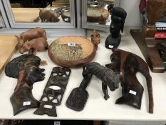 A quantity of African tribal carved wooden items