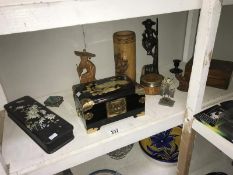 A mixed lot including lacquered boxes, wooden figures etc.