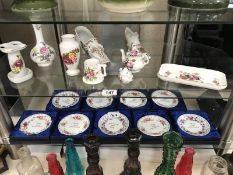 2 shelves of floral china ornaments & dishes