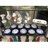 2 shelves of floral china ornaments & dishes