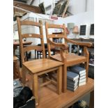 A heavy oak carver chair and 1 other