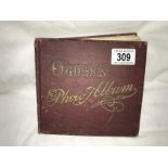 A Victorian Ogdens photo album containing tea cards