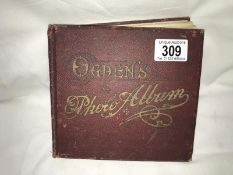 A Victorian Ogdens photo album containing tea cards