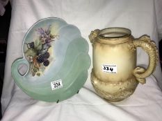 An Austrian porcelain fish jug and a hand painted plate