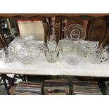 A quantity of glassware including bowls, jug & decanter etc.