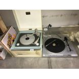 A vintage Dansette Bermuda record player, Akai APD2 turntable with a quantity of records.