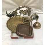 A mixed lot of brassware including tray, ashtray, bell etc.