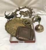 A mixed lot of brassware including tray, ashtray, bell etc.