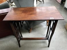 An Edwardian mahogany side table