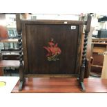 An oak firescreen with barley twist supports & ship decoration